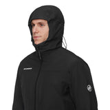 Mammut Treeline 3 in 1 HS Giacca Gore-Tex con Piumino Uomo – Black, indossata con cappuccio
